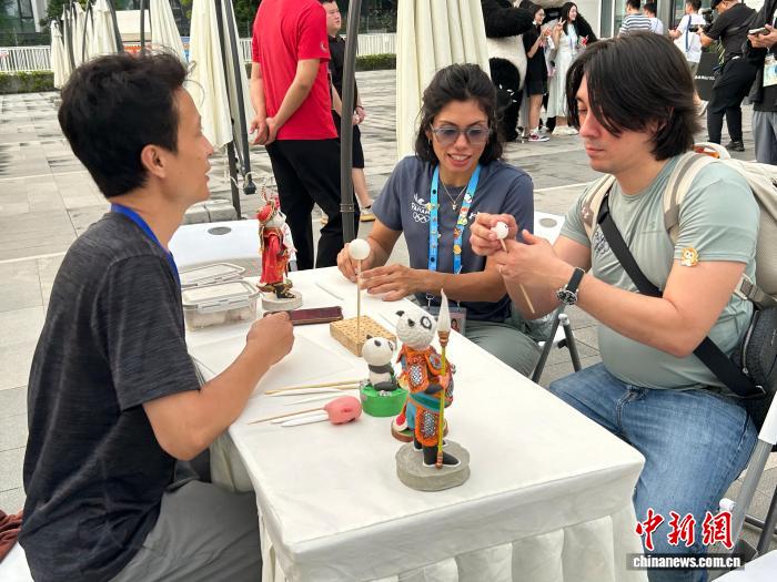 成都世运会的熊猫故里：像爱大熊猫一样爱中国